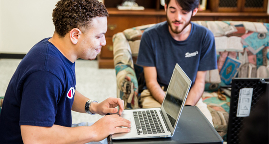 Students working on computer