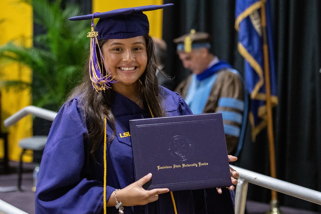 Graduate with diploma