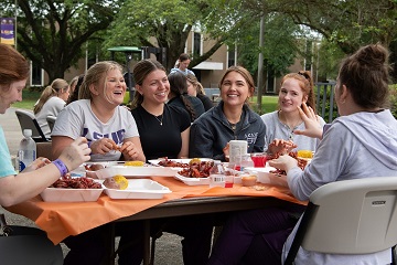 Students at table eating